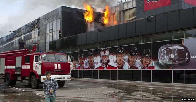 The Donetsk ice hockey stadium was set on fire on Tuesday, reportedly after an armed group broke in