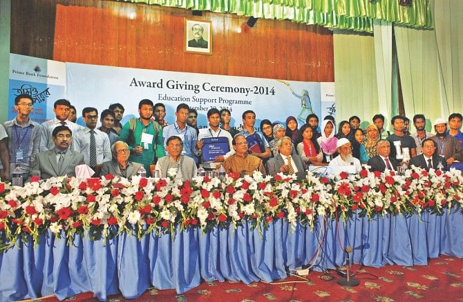 Guests alongside meritorious, underprivileged students who were provided stipends by the Prime Bank Foundation under its Education Support Programme in the capital's LGED auditorium yesterday. Photo: Star