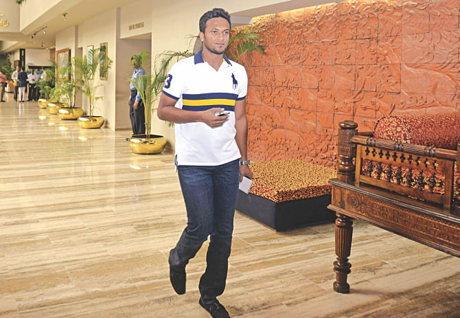 Ace Bangladesh all-rounder Shakib Al Hasan leaves the Pan Pacific Sonargaon hotel yesterday as the Tigers enjoyed an unscheduled day's break after a three-day finish of the first Test against Zimbabwe on Monday. PHOTO: STAR