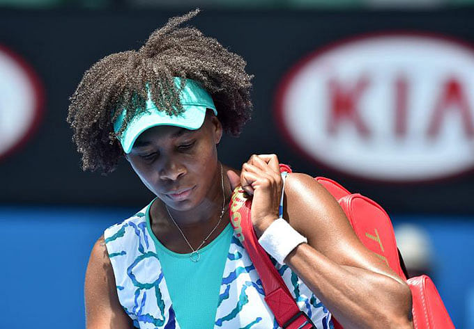 Venus Williams of the US walks off the court after defeat in her women's singles match against compatriot Madison Keys, on day ten of the Australian Open, in Melbourne, on January 28, 2015. Photo: AFP