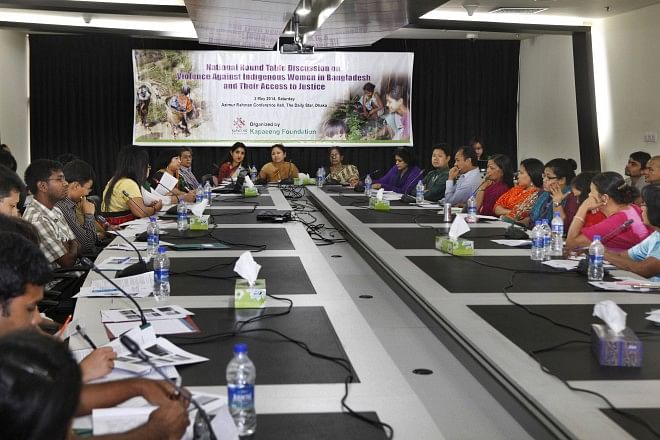 Speakers at the National Roundtable Discussion on Violence Against Indigenous Women in Bangladesh and Their Access to Justice organised by rights organisation Kapaeeng Foundation at Azimur Rahman Conference Hall of The Daily Star Centre in the capital yesterday.  Photo: Star