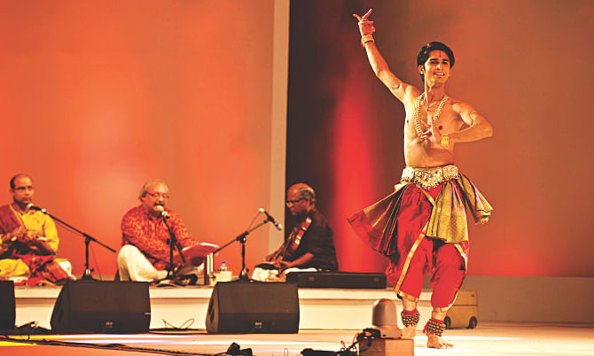 Artiste Amit Chowdhury performing bharatanatyam during the fourth day of the Bengal Classical Music Festival 2014 at the Army Stadium yesterday. Photo: Rashed Shumon