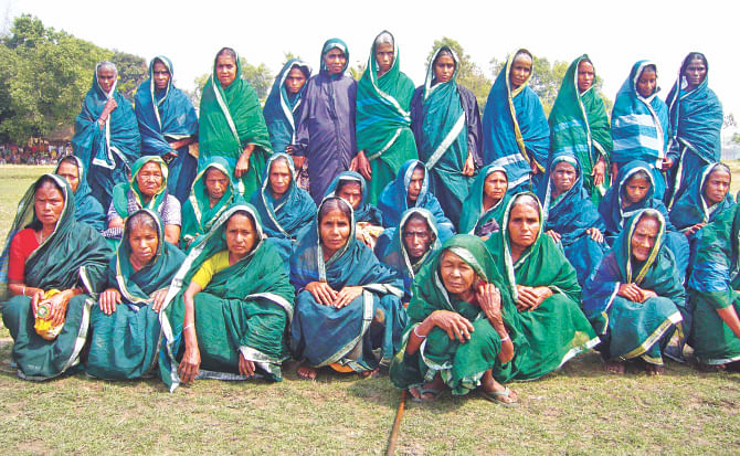 Widows of those massacred in Sherpur's Sohagpur, also known as the Bidhoba Palli (village of the widows) during the Liberation War want to see the verdict on Kamaruzzaman executed as soon as possible. File Photo