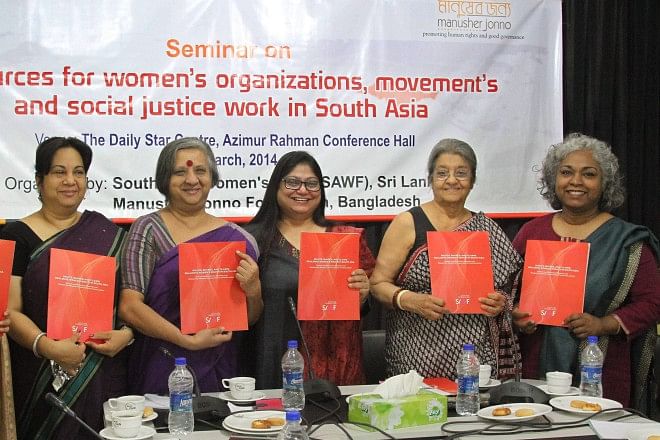 From left, Maheen Sultan, Khushi Kabir, Tulika Srivastava, Hameeda Hossian, and Tahera Yeasmin with the copies of the report, "Rights, Shares, and Claims: Realising Women's Rights in South Asia", during its launch in the capital's The Daily Star Centre yesterday.  Photo: Star