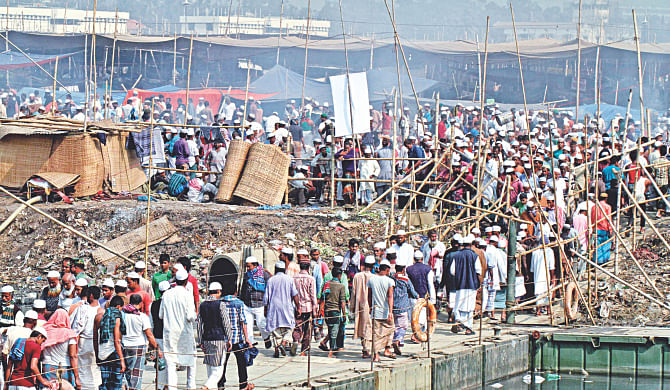 Defying hartal and indefinite countrywide blockade enforced by the BNP-led 20-party alliance, hundreds of thousands of Muslims from home and abroad gather on the bank of the river Turag at Gazipur's Tongi yesterday as the second phase of Biswa Ijtema, the second largest congregation for the community, begins today. The three-day event will conclude on January 18 through the final supplication, Akheri Munajat. Law enforcers say security measures have been intensified at the 160-acre venue. Tablig Jamaat has been organising the event since 1946. Photo: Anisur Rahman