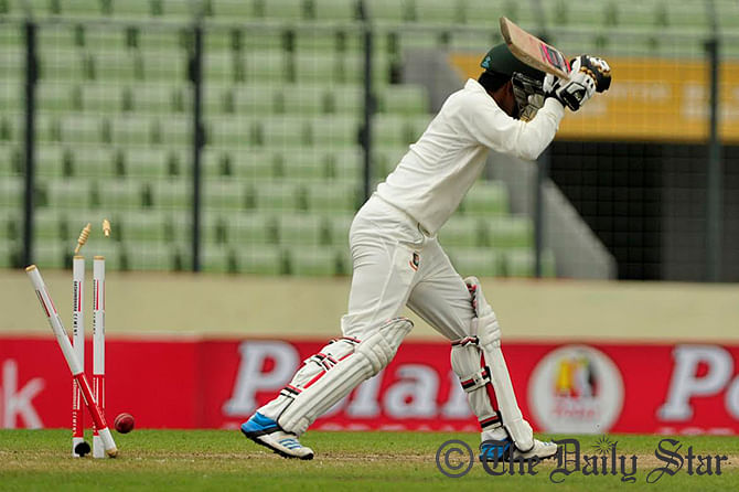Zimbabwe's Tinashe Panyangara bowled out Bangladesh opener Shamsur Rahman on the fourth over of the Tigers' second innings at Mirpur stadium on Monday. Photo: Firoz Ahmed