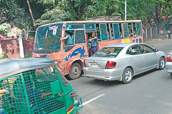 Even a requisitioned bus carrying law enforcers violates the law on Hare Road. Photo: Amran Hossain/Sk Enamul Haq/Rashed Shumon