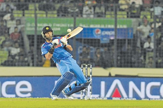 India all-rounder Yuvraj Singh played some exciting shots during his aggressive innings of 43-ball 60 against Australia at Mirpur yesterday.  Photo: Star 