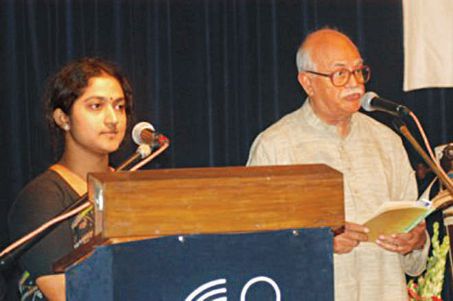 Professor Zillur Rahman Siddiqui and Sumana Biswas were reciting poem on Tagore's Poetry Recitation Day, 2005. Photo: Star File