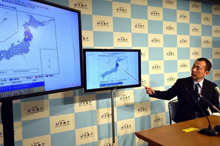 An earthquake expert from Japan's Meteorological Agency, Yasuhiro Yoshida, speaks at a press conference at their headquarters in Tokyo on February 17, 2015 after an earthquake hit northern Japan. Photo: AFP