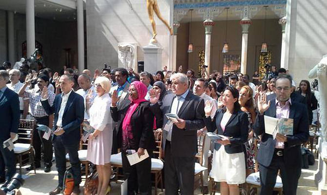 Oath taking ceremony for being US citizen. Photo taken from US Citizenship and Immigration Service's facebook page 