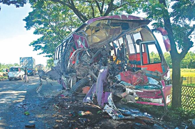 This Star photo taken on August 8, 2014 shows the mangled wreckage of the bus after it had a head-on collision with a truck on the Dhaka-Chittagong highway at Sitakunda. Four people died in the accident.