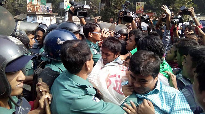Demonstrators and police scuffle during Sunday's demonstration of second-time Dhaka University admission seekers. Photo courtesy: Sadik Reza