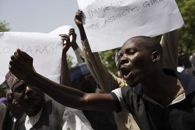School teachers take part in a rally to call for the release of abducted schoolgirls held by Boko Haram and to demand better security in Maiduguri May 22, 2014. Photo: Reuters