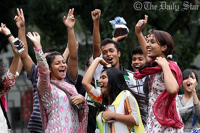 Boys and girls of Adamjee Cantonment Public School & College of the capital on Wednesday celebrate their success in this year’s Higher Secondary Certificate (HSC) and equivalent examinations. Photo: Palash Khan