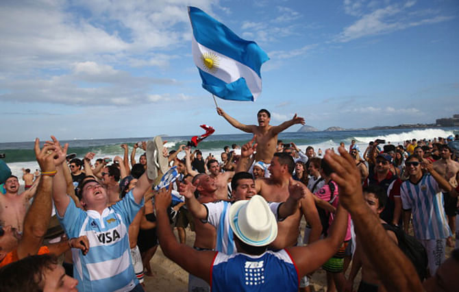 Argentina fans gather on Copacabana Beach ahead of the 2014 FIFA World Cup Brazil Final match on July 12. Photo: Getty Images 