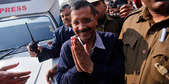 1.	Aam Aadmi (Common Man) Party (AAP) chief and its chief ministerial candidate for Delhi, Arvind Kejriwal gestures to his supporters after casting his vote outside a polling station during the state assembly election in New Delhi February 7, 2015. Photo: Reuters 