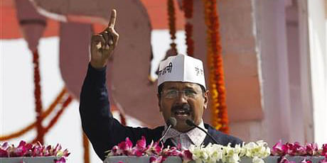 This AP file photo taken on December 28, 2013 shows Aam Aadmi Party, or Common Man's Party, leader Arvind Kejriwal speaks to the crowd after being sworn-in as chief minister of Delhi in New Delhi, India.