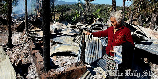 Miscreants set fire to the houses of indigenous people in Suridaspara area under Burighat union of Naniarchar, Rangamati Tuesday morning. Photo: Suprio Chakma 