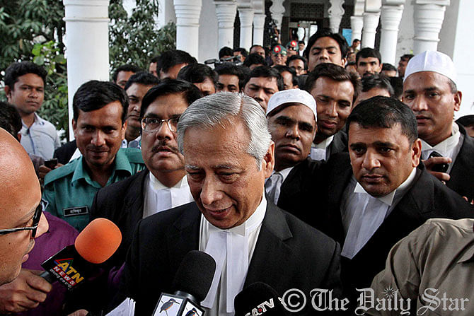Attorney General Mahbubey Alam talks to media after the Supreme Court upheld verdict of capital punishment to Jamaat leader and war criminal Muhammad Kamaruzzaman for his crimes against humanity. Photo: Anisur Rahman