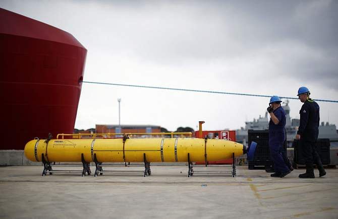 A Phoenix underwater mapping robot is pictured on the dock at HMAS Stirling naval base near Perth, March 30, 2014. The device will be placed on the Australian Defence ship Ocean Shield and used to help map the location of the sunken wreckage of Malaysia Airlines Flight MH370 in the southern Indian Ocean. Photo: Reuters