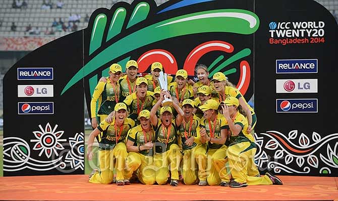 Australia Women celebrate with the World T20 trophy at Mirpur Sunday after beating England Woman by 6 wickets. Photo: Firoz Ahmed