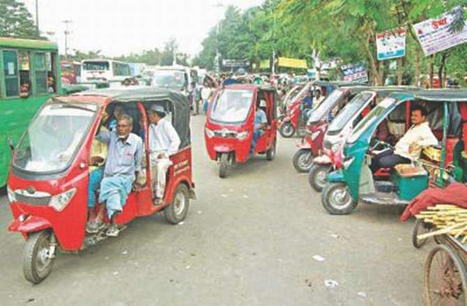 This Star file photo taken in December, 2012 shows unauthorised battery-run auto-rickshaws parked in Katgor area of Chittagong city.