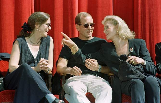 Actress Lauren Bacall (R), widow of actor Humphrey Bogart, talks with her children Leslie and Stephen at ceremonies honoring Humphrey Bogart with an honorary postage stamp at Mann's Chinese Theatre in Hollywood,California in this file picture taken July 31, 1997. Photo: Reuters