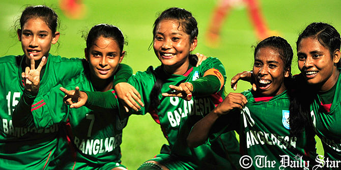 Source: Bangladesh women celebrate the goals against UAE during a match of AFC U-16 Women's Championship at Bangabandhu Stadium in Dhaka on Friday. Photo: Amran Hossain