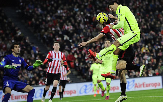 : Suarez (right) doubled Barca's advantage midway through the first half as they swept past Athletic Bilbao