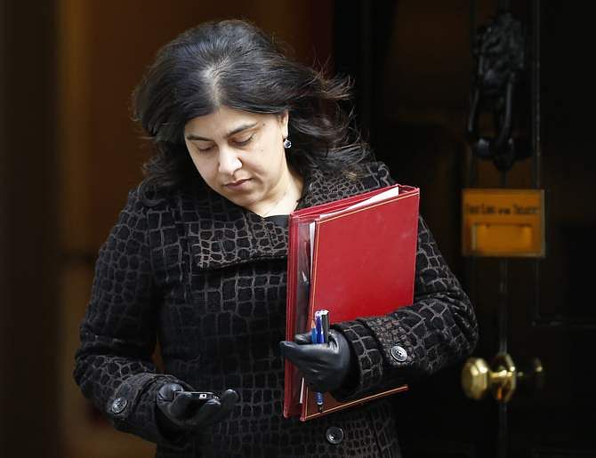 This file photograph shows British Senior Minister of State at the Foreign and Commonwealth Office, Baroness Sayeeda Warsi, leaving 10 Downing Street after a cabinet meeting in central London March 4, 2014. Photo: Reuters