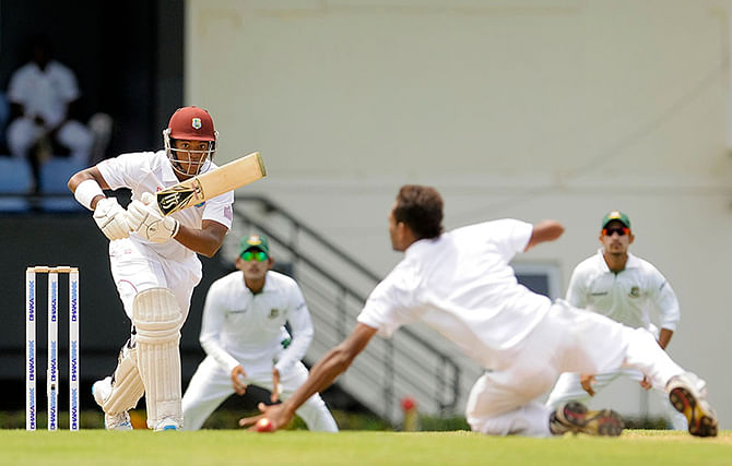 Leon Johnson drives Shafiul Islam down the ground in West Indies v Bangladesh 2nd Test at St Lucia on the first day, September 13. The photo is taken from cricinfo.