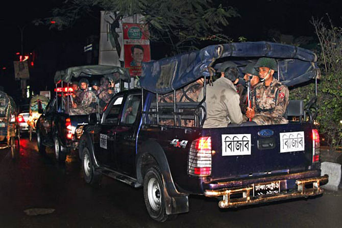 Border Guard Bangladesh members patrol on a street in Dhaka. Star file photo