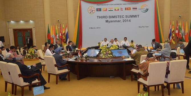 Bimstec members including Bangladesh Prime Minister Sheikh Hasina and Indian PM Manmohan Singh attend the inaugural ceremony of the third Bimstec Summit at the International Conference Centre at Nay Pyi Taw in Myanmar Tuesday. Sri Lanka, Thailand, Myanmar, Bhutan and Nepal are the other member countries of the Bimstec. This photo is taken from Twitter.