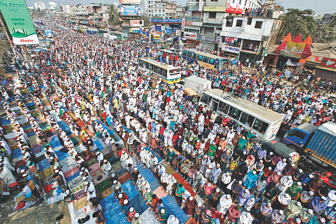 Muslims take up nearly every available space on Dhaka-Mymensingh Highway, including the tops of vehicles, at Tongi, Gazipur while offering Jumma prayers Friday, the beginning of Biswa Ijtema's second phase. Photo: STAR