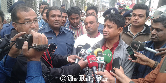 Harun-ur-Rashid, superintendent of police in Gazipur, talks to reporters at a press briefing held on the Bhawal Bodr-E-Alam Government College ground in the Sadar upazila on Friday. Photo: Star