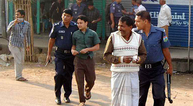 Police are seen taking two activists of Islami Chhatra Shibir after detaining them at BRTC bus depot at Satmatha intersection in Bogra town Saturday morning. Photo: STAR