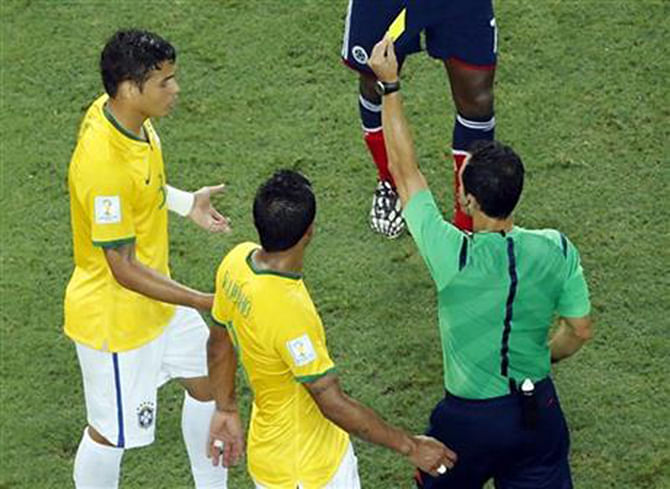 Brazil's Thiago Silva gets a yellow card during the World Cup quarterfinal soccer match between Brazil and Colombia at the Arena Castelao in Fortaleza, Brazil on July 4. Photo: AP 