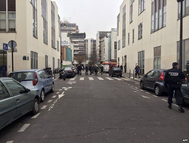 Police and rescue services near the office of Charlie Hebdo. Photo: AFP