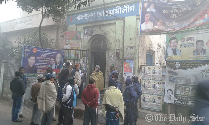 People gather in front of Awami League office in Chandpur after it has been set on fire on Thursday morning. Photo: STAR
