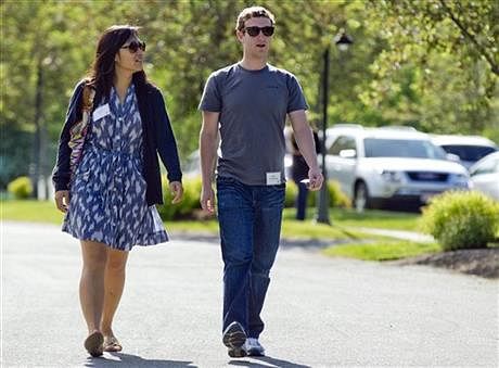  In this July 9, 2011 file photo, Mark Zuckerberg, president and CEO of Facebook, walks with Priscilla Chan during the 2011 Allen and Co. Sun Valley Conference, in Sun Valley, Idaho. Zuckerberg and his wife Chan were the most generous American philanthropists in 2013, with a donation of 18 million Facebook shares, valued at more than $970 million, given to a Silicon Valley nonprofit in December. Photo: AP