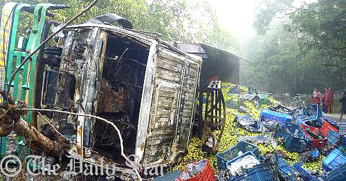 A badly burnt down truck that crashed by the road in Kansat area of Shibganj upazila, Chapainawabganj after blockaders hurled a patrol bomb on it early today. A trucker and his two helpers sustained serious burn injuries in the deadly attack.