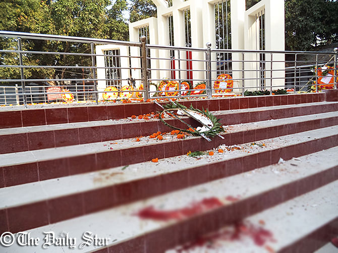 Blood scattered on the stairs at a Shaheed Minar in Shibganj upazila of Chapainawabganj where a BNP man was killed in a crude bomb attack early Wednesday when he went to pay tribute to martyrs on the Independence Day. Photo: STAR