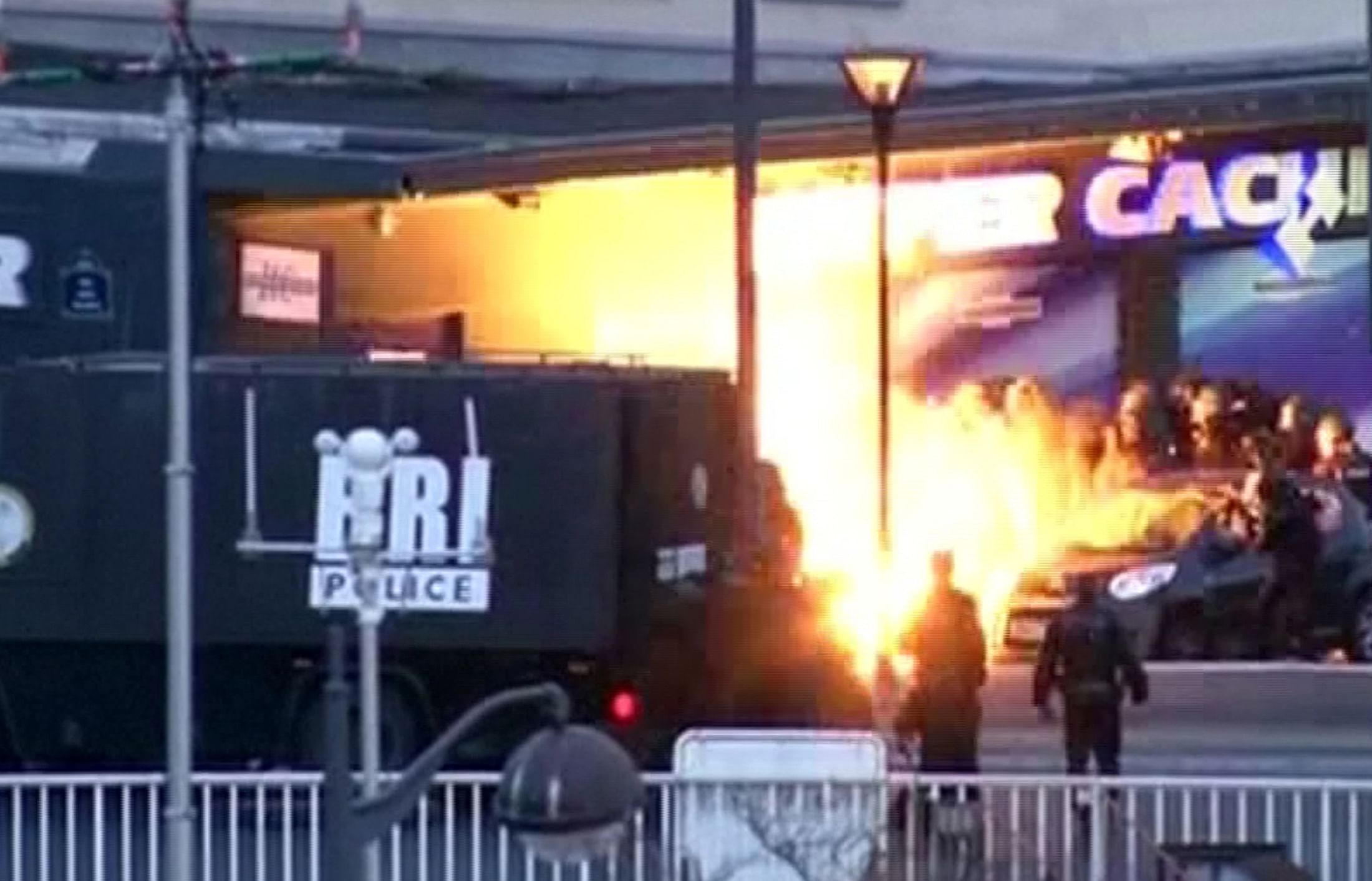 A still image from video shows an explosion lighting the front of a kosher supermarket as French police special forces launch their assault, where several people were taken hostage near the Porte de Vincennes in eastern Paris January 9, 2015. Photo: Reuters