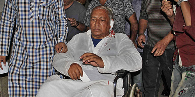 Netrakona-1 Awami League lawmaker Chhabi Biswas are seen on a wheelchair at Dhaka Medical College and Hospital after an attack on his car on Wednesday. Photo: Star