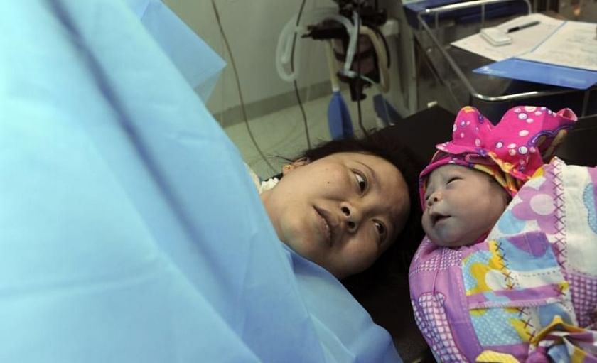 Childbirth is not all ‘natural’ and without pain, partners of expectant mothers learn in a service provided by Aima maternity hospital in Shandong province for ‘taster sessions’. Photo: Reuters
