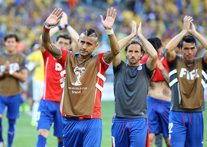 Arturo Vidal of Chile and his teammates thank their supporters after the 2014 FIFA World Cup Brazil round of 16 match between Brazil and Chile at Estadio Mineirao on June 28, 2014 in Belo Horizonte, Brazil. Photo: Getty Images