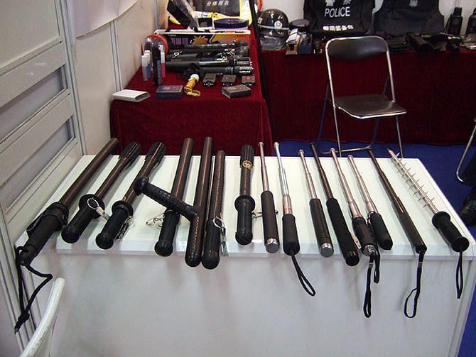 A selection of Chinese straight, side handled and telescopic batons, photographed at China Police 2008. A new report by Amnesty International documents the international trade in Chinese-made torture instruments. Photo courtesy by Robin Ballantyne