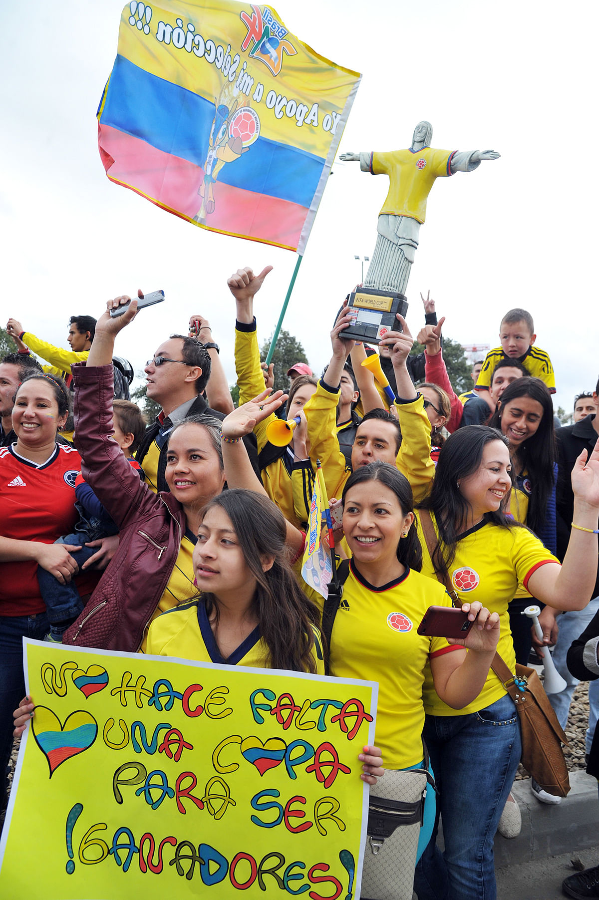 A crowd of Colombian fans greet their national football team upon their arrival in Bogota after the FIFA World Cup Brazil 2014, on July 6, 2014. Photo: Getty Images