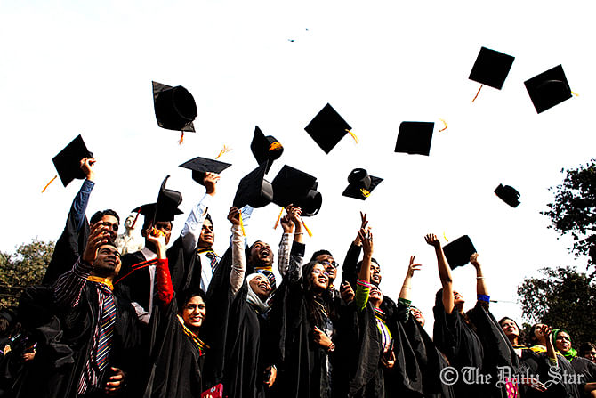 Graduates at the Dhaka University celebrate their convocation Tuesday, January 13, 2014. Photo: Rashed Shuman